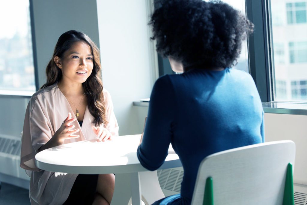 a female client during an intervention facilitated by a female expert in a private place