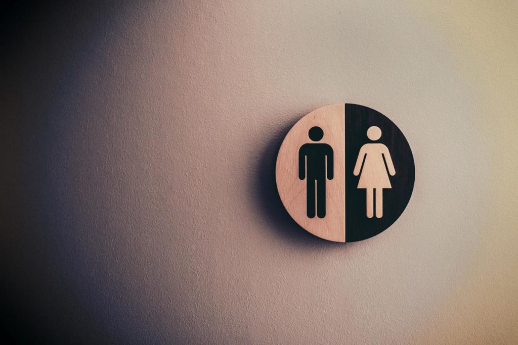 Male and Female Signage on Wall Gender Dysphoria and Mental Health