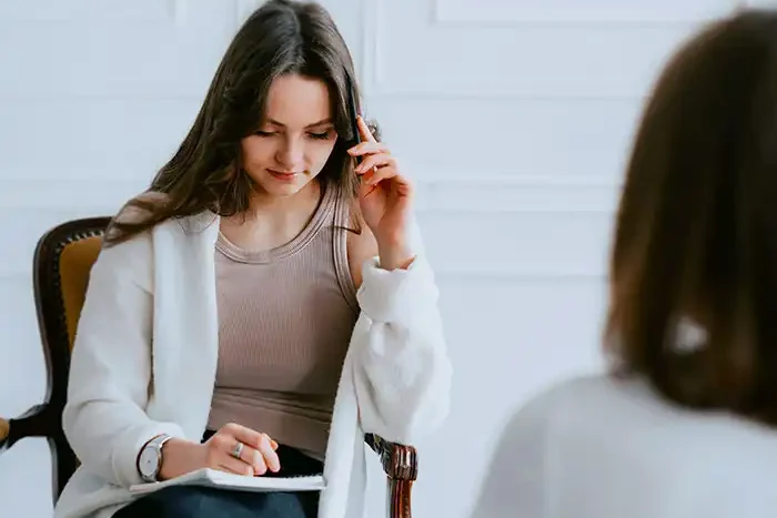 a female client with a female mental health expert in orange county