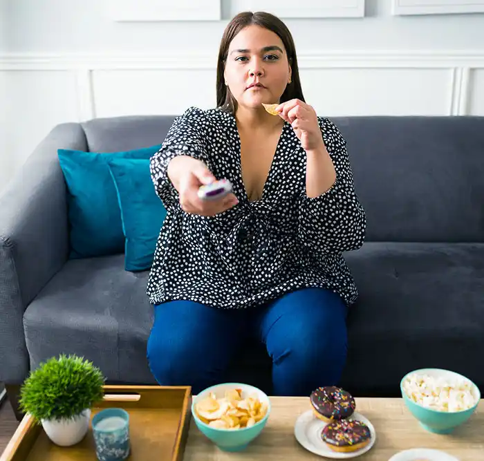 woman binge eating