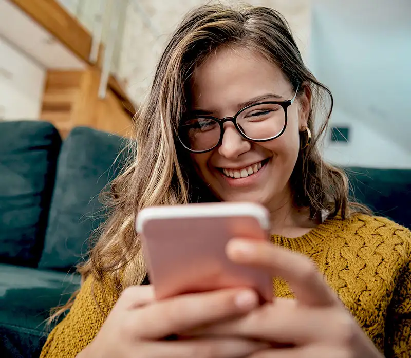 woman verifying her insurance coverage for her addiction treatment