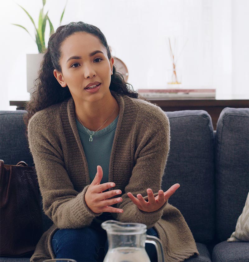 a woman explaining something during Benzodiazepine addiction treatment in california