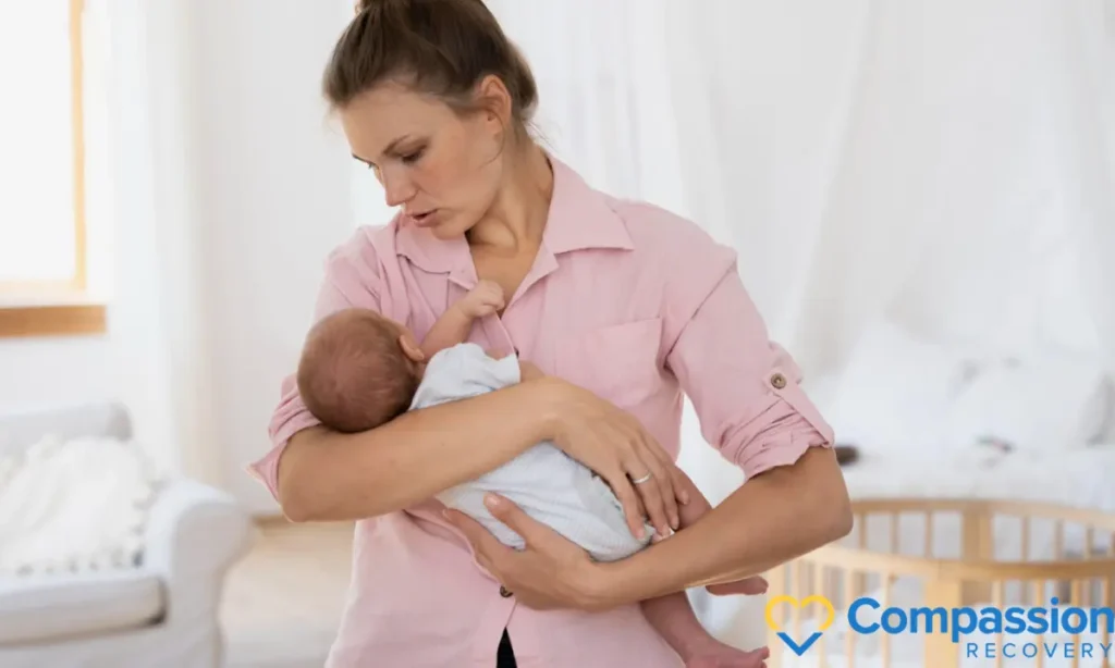 feature image for Postpartum Depression. A mother comforting her baby