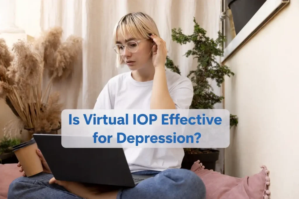 Person attending virtual IOP therapy session on laptop for depression treatment at home