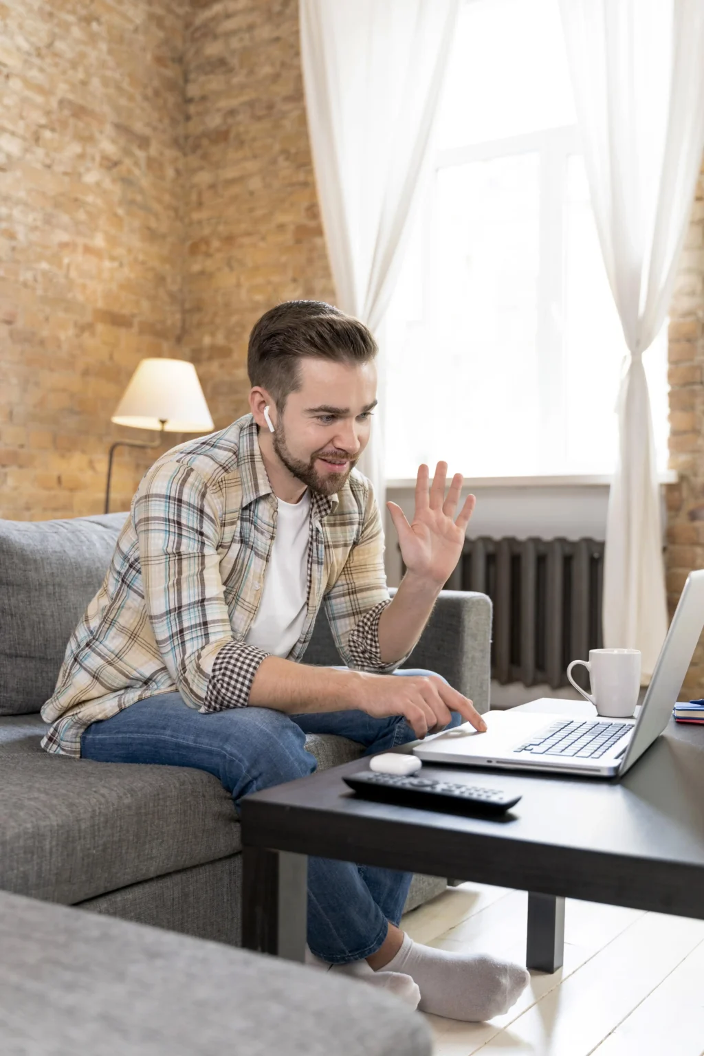 Man joining a video session from home